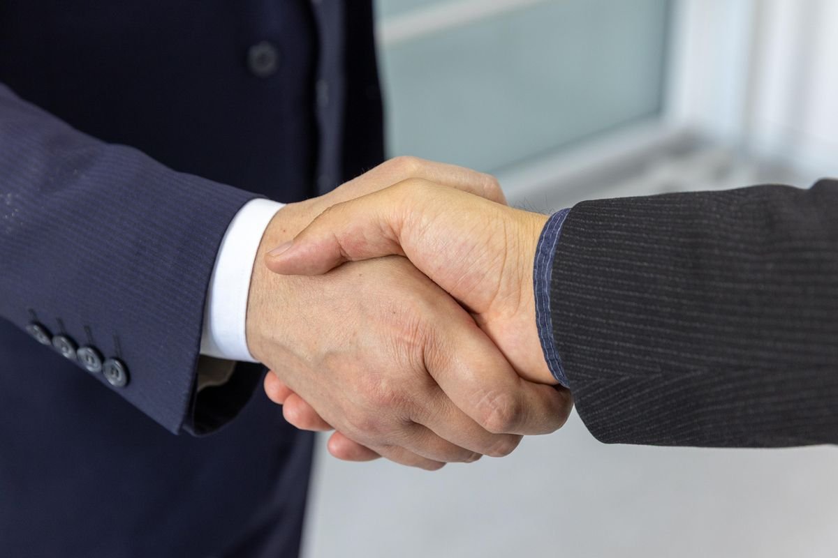 A handshake closing a property transaction